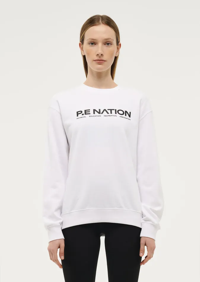 Baseline QUALIFY SWEAT IN OPTIC WHITE PE Nation Women