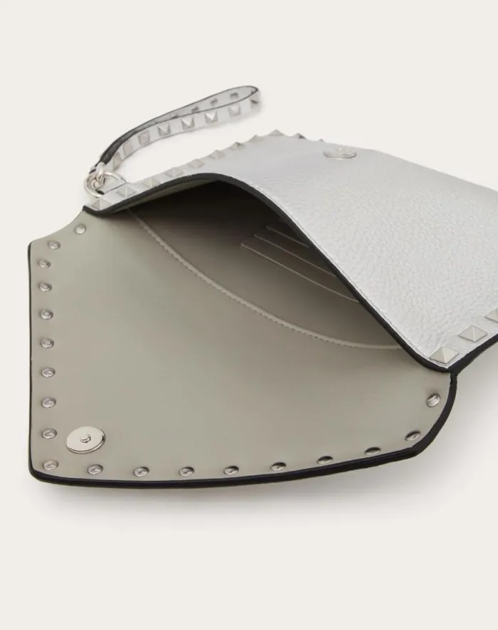 Valentino Mini Bags Woman Rockstud Metallic Grainy Calfskin Clutch Bag For Woman In Silver Silver