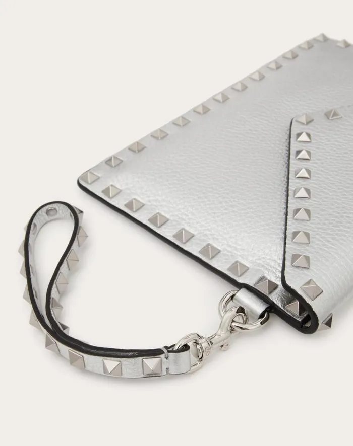 Valentino Mini Bags Woman Rockstud Metallic Grainy Calfskin Clutch Bag For Woman In Silver Silver